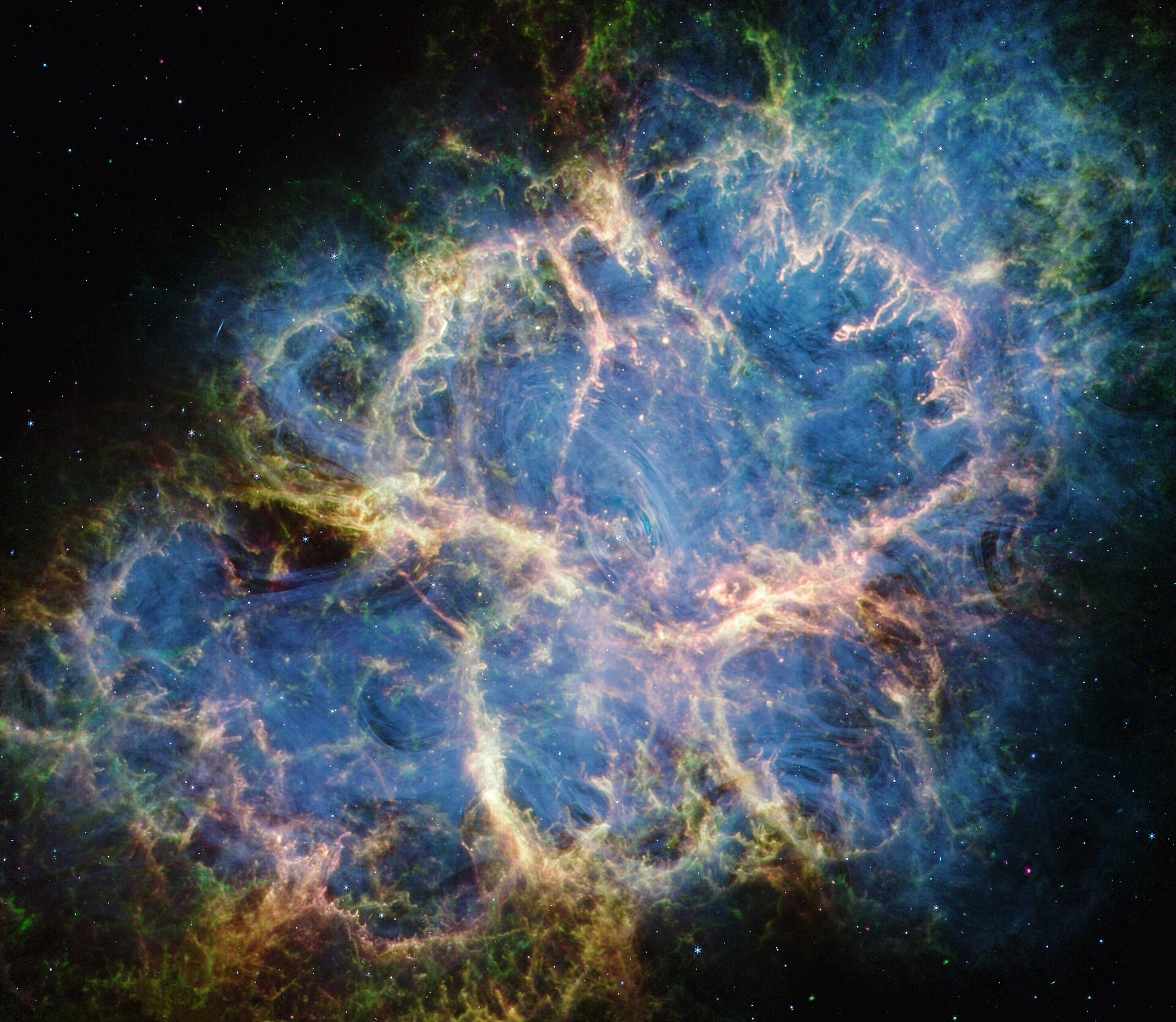 The Crab Nebula, filaments of gas photographed by the James Webb Space Telescope.